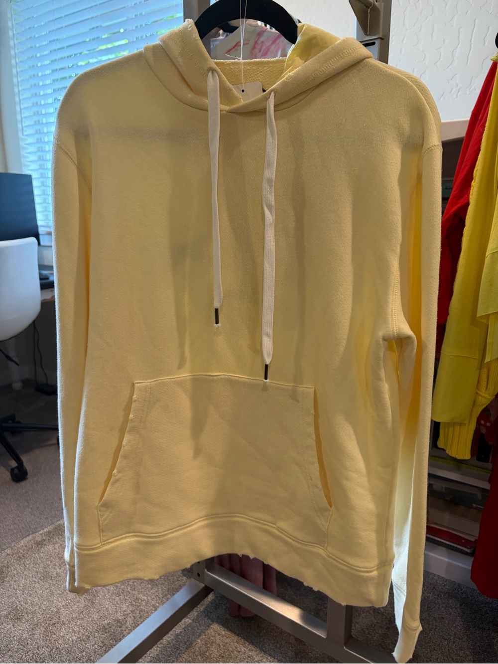 Chaser light yellow zip up hoodie with distressed detailing